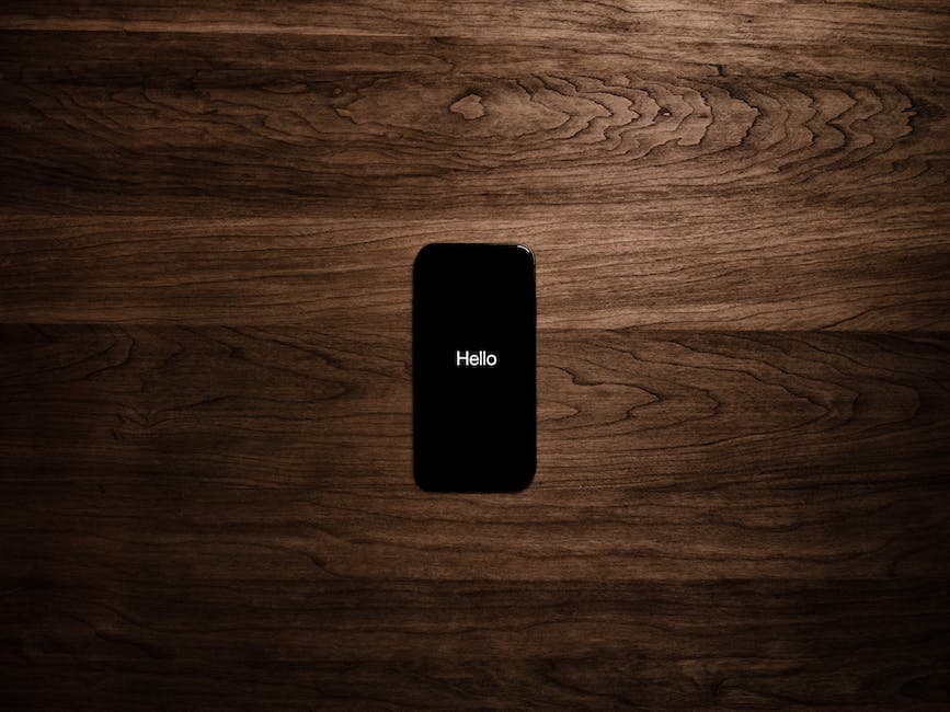Turned-on Black Iphone 7 Displaying Hello