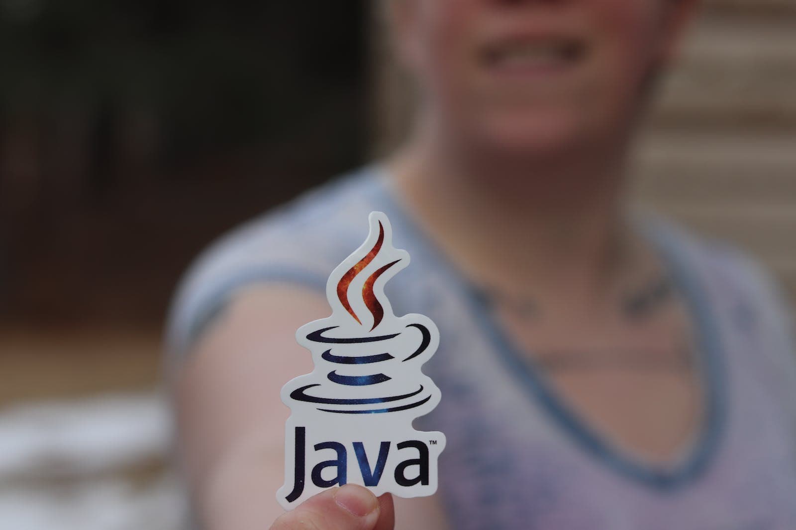 Smiling Man in Purple and White Tank Top with Java Logo keyholder