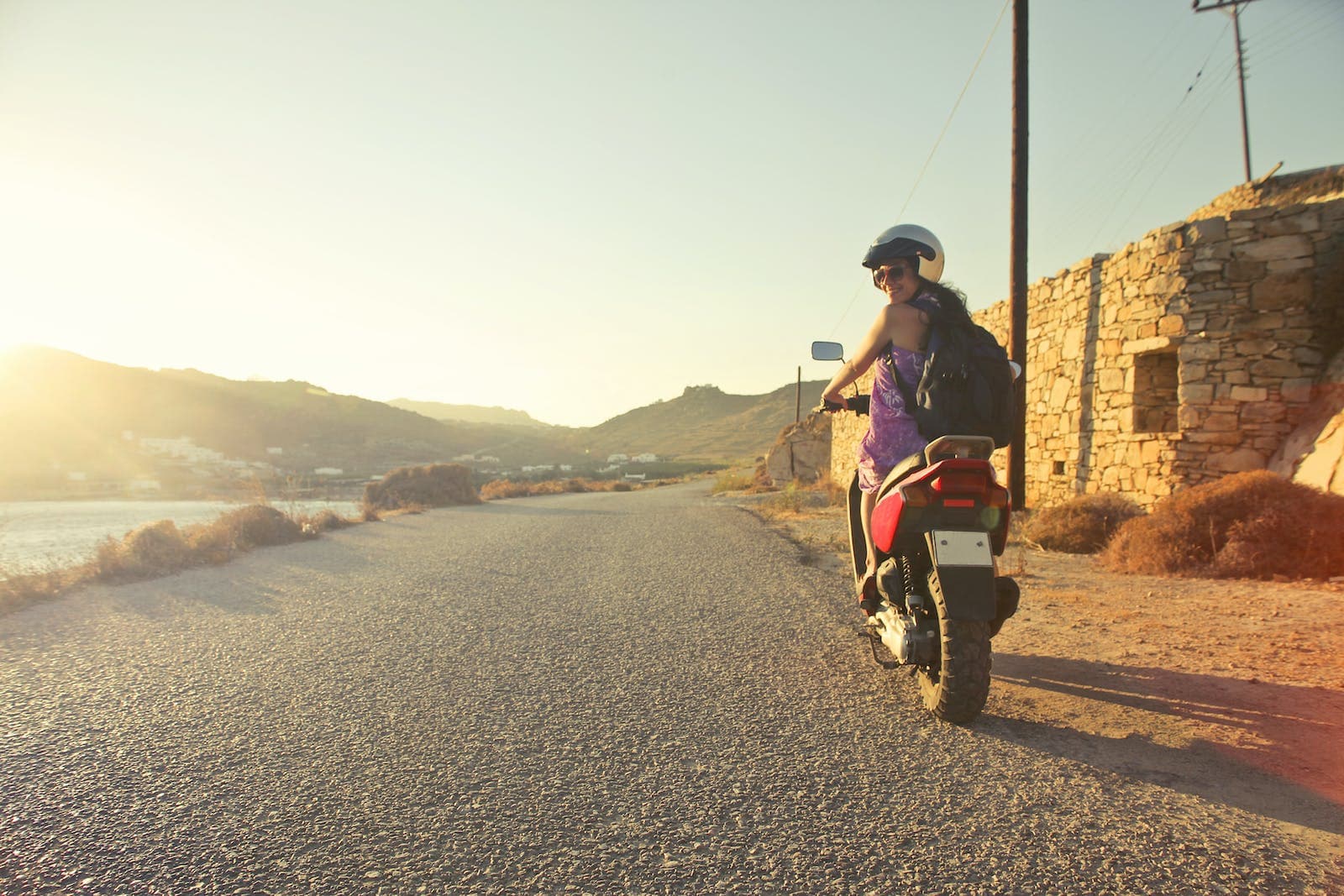 woman riding on a motor cycle