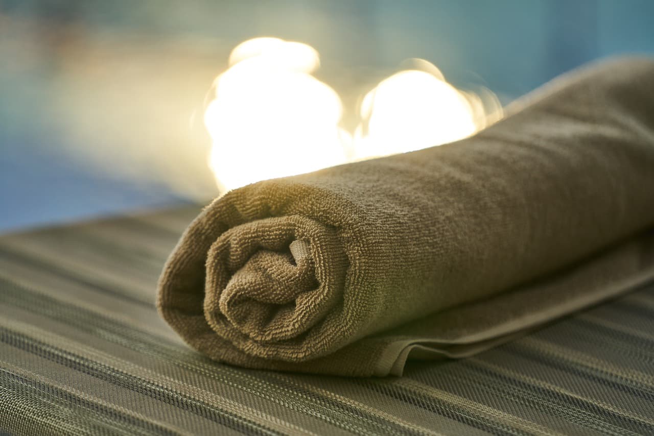 towel by a pool in a spa hotel