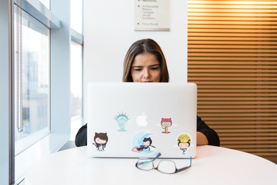 Woman Using Macbook
