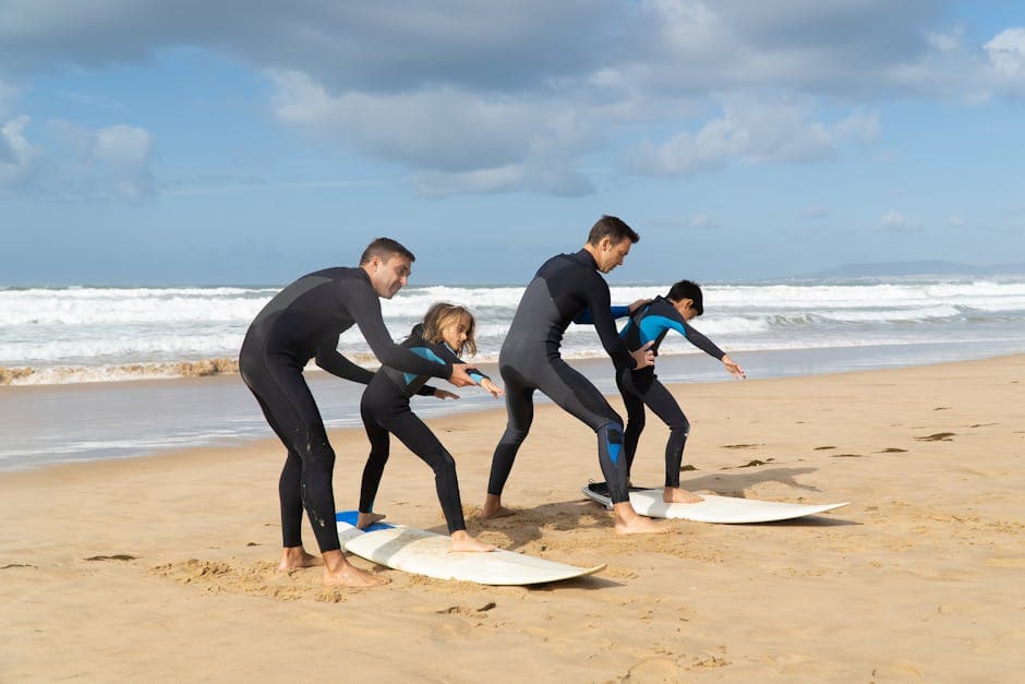 Instructors Teaching Kids How to Surf