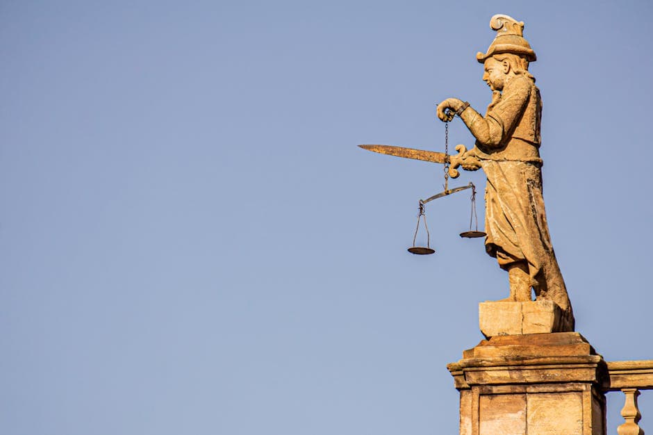 A Statue with a Sword ad Weighing Scale