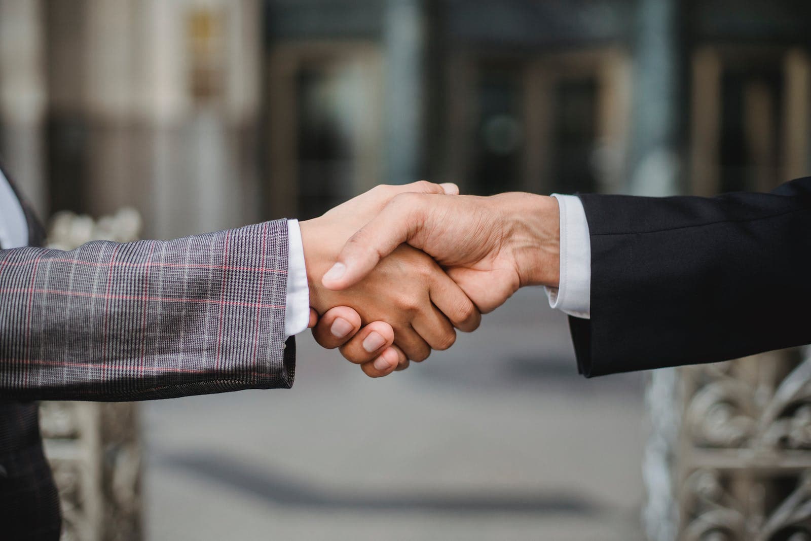 Two People Shaking Hands