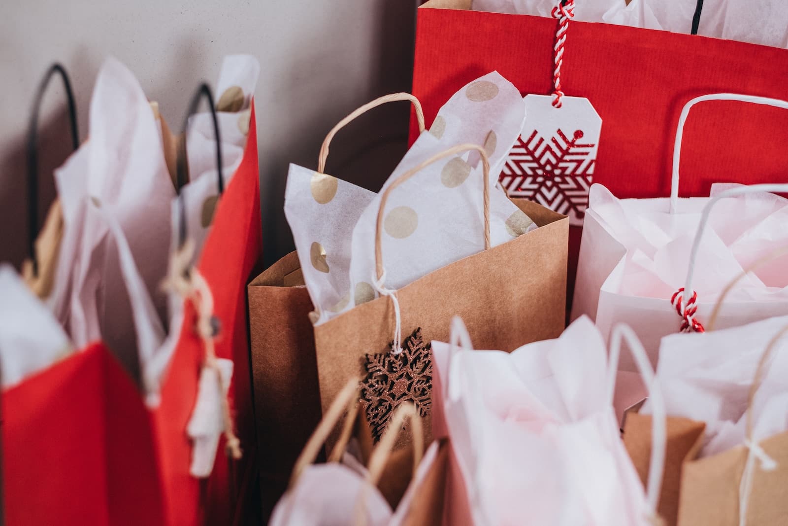 shallow focus photography of paper shopping bags