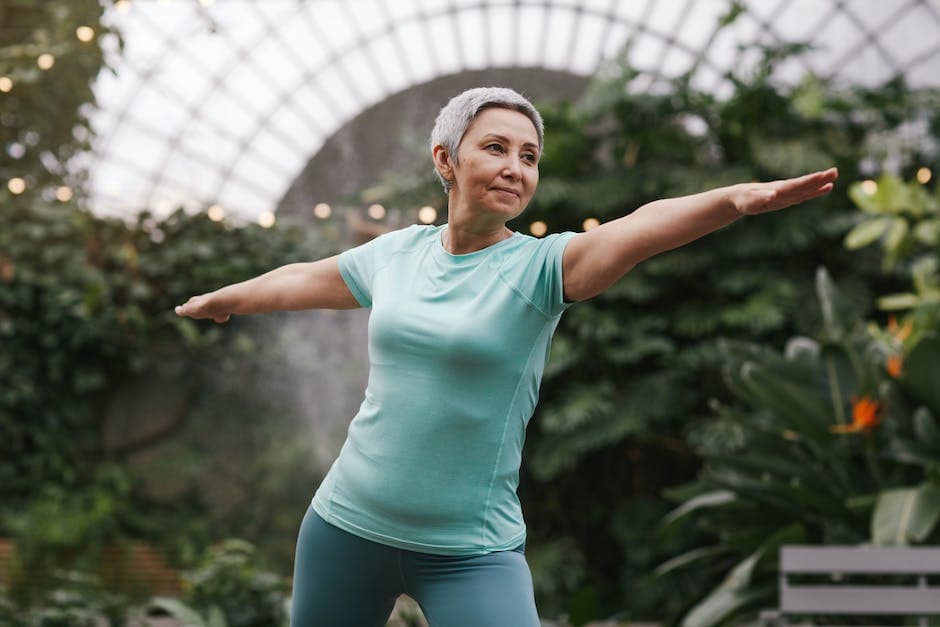 Woman Doing Warrior Pose at Yoga Retreat